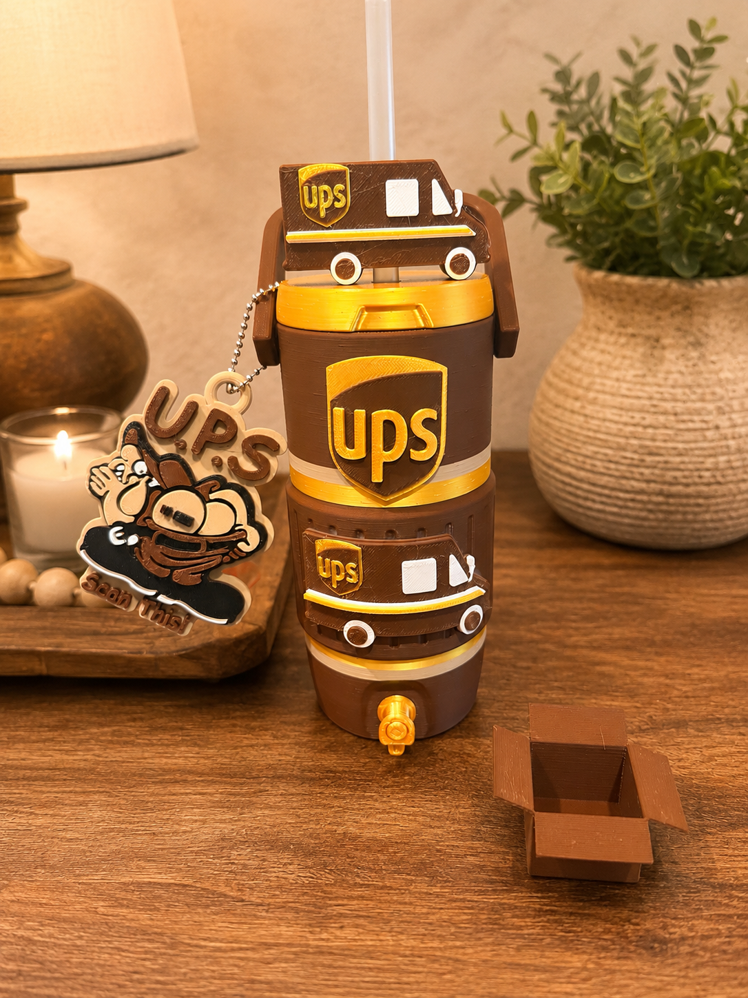 Ups can holder with keychain and straw topper